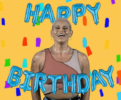 Woman Surrounded By Blue Balloons Saying Happy Birthday GIF