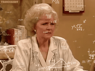 Woman Surrounded By Mathematical Equations GIF