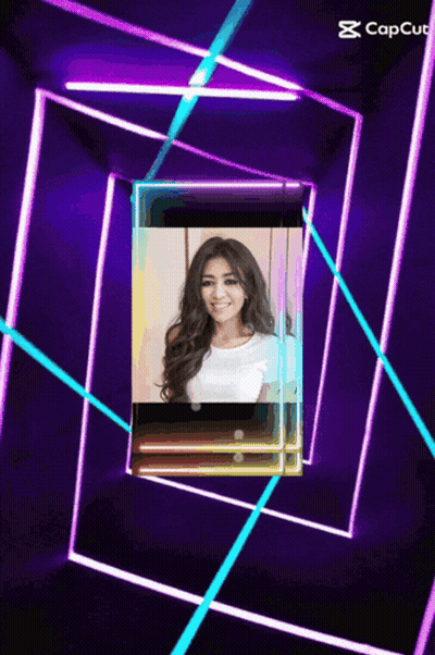Woman Surrounded By Purple And Blue Neon Lights GIF