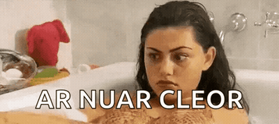 Woman Taking Bath With Ar Nuar Cleor Text GIF