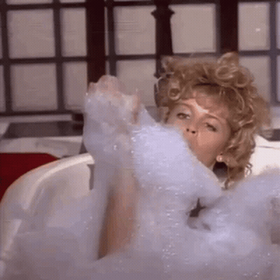 Woman Taking Bubble Bath GIF