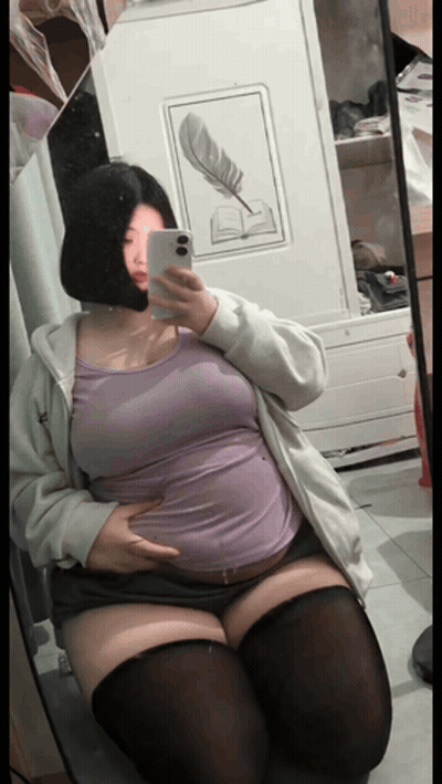 Woman Taking Mirror Selfie GIF