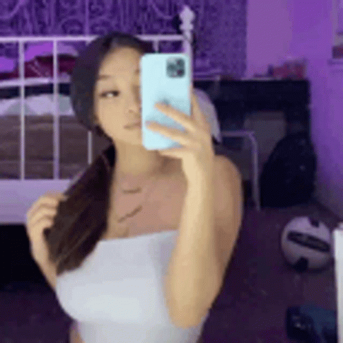 Woman Taking Mirror Selfie GIF