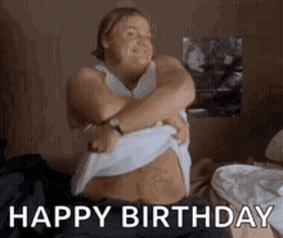 Woman Taking Off Shirt Saying Happy Birthday GIF