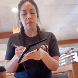 Woman Taking Order With Tablet And Pen GIF