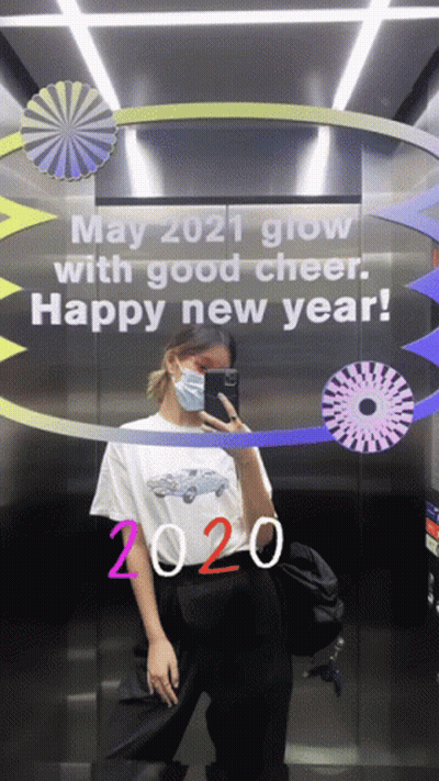 Woman Taking Picture In Elevator GIF