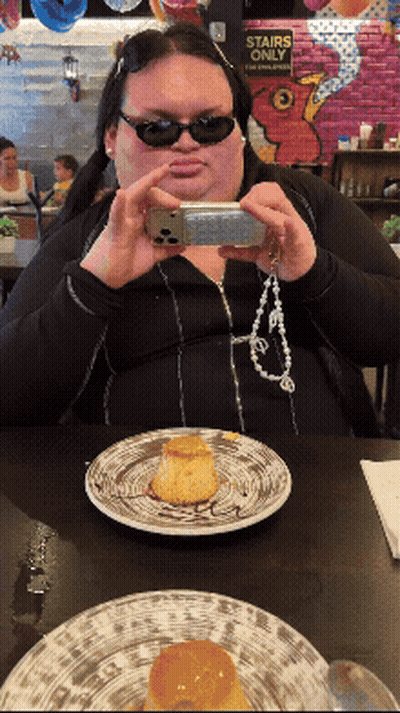 Woman Taking Picture Of Food With Stairs Only Sign GIF