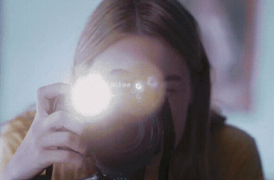 Woman Taking Picture With Nikon Camera GIF