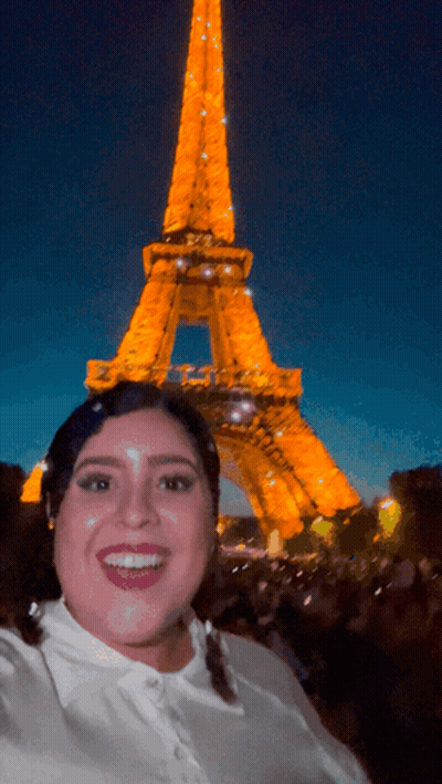 Woman Taking Selfie In Front Of Eiffel Tower GIF