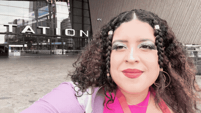 Woman Taking Selfie In Front Of Station GIF