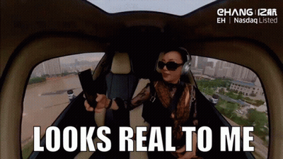 Woman Taking Selfie In Helicopter Looks Real To Me GIF