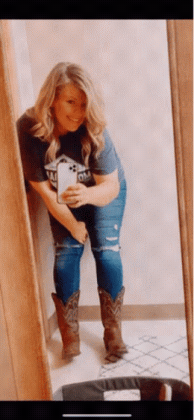 Woman Taking Selfie In Mirror GIF