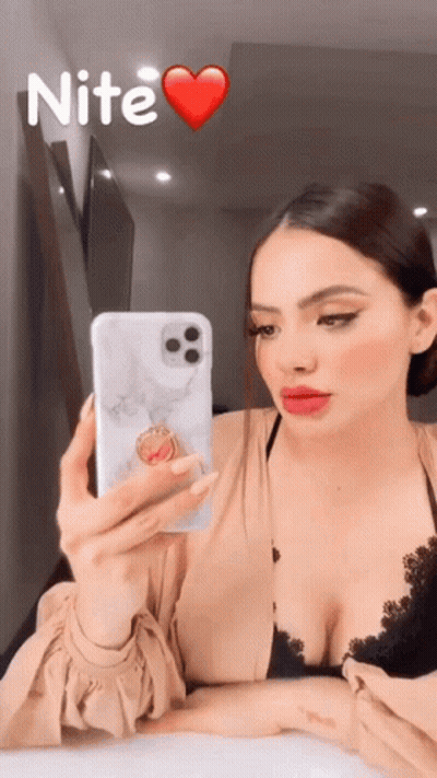 Woman Taking Selfie In Mirror Saying Nite GIF
