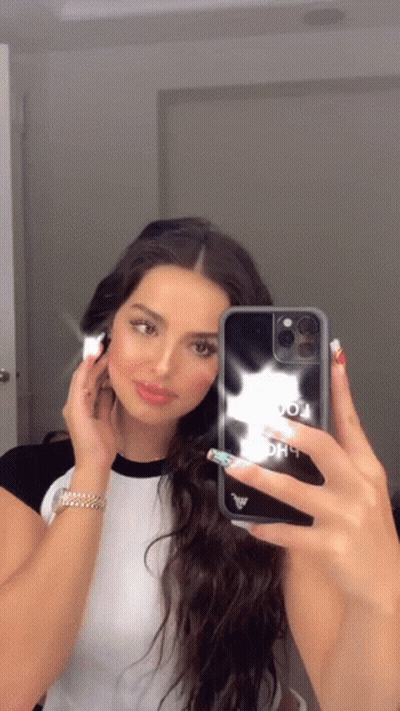 Woman Taking Selfie In Mirror With Phone Case GIF