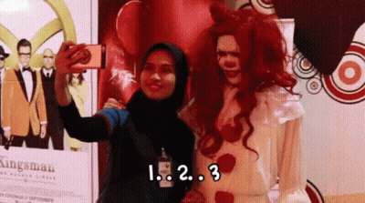 Woman Taking Selfie With Clown Saying Kingsman