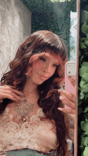 Woman Taking Selfie With Pink Phone GIF