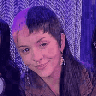 Woman Taking Selfie With Pink Phone GIF
