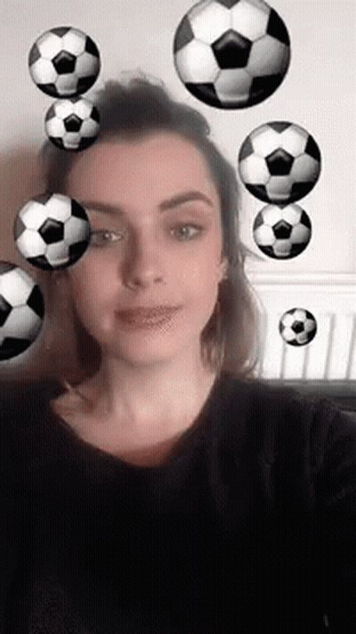 Woman Taking Selfie With Soccer Balls GIF