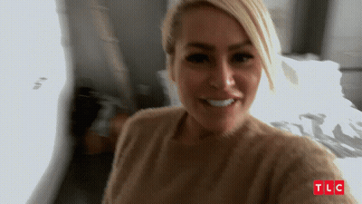 Woman Taking Selfie With TLC GIF