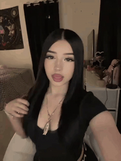 Woman Taking Selfie With Tongue Out GIF