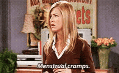 Woman Talking About Menstrual Cramps GIF