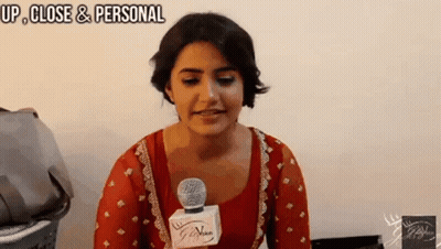 Woman Talking Into Microphone GIF