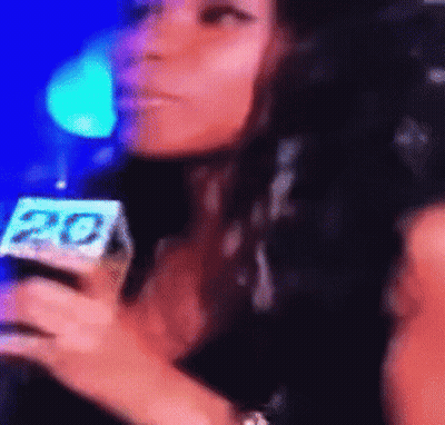 Woman Talking Into Microphone Number 20 GIF