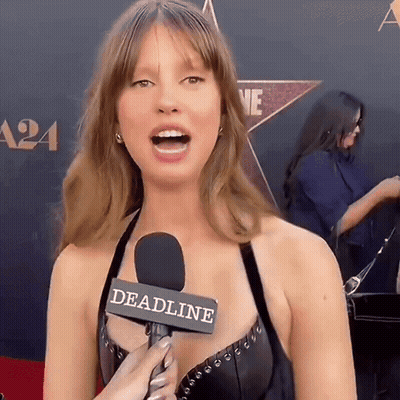 Woman Talking Into Microphone Saying Deadline GIF