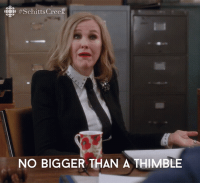 Woman Talking Into Microphone With Number 20 GIF