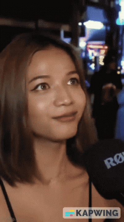 Woman Talking Into Rode Microphone Saying Kapwing GIF