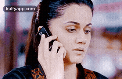 Woman Talking On Cell Phone GIF