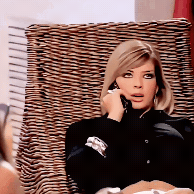 Woman Talking On Cell Phone GIF