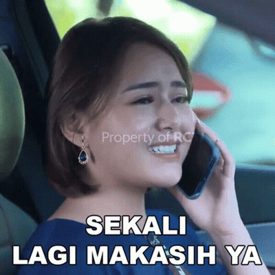 Woman Talking On Cell Phone In Car GIF