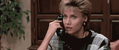 Woman Talking On Cell Phone GIF