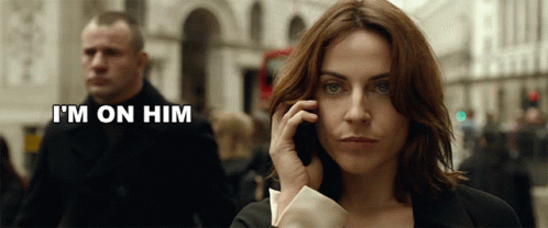Woman Talking On Cell Phone GIF