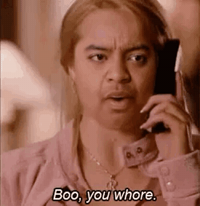 Woman Talking On Cell Phone Making Funny Face GIF