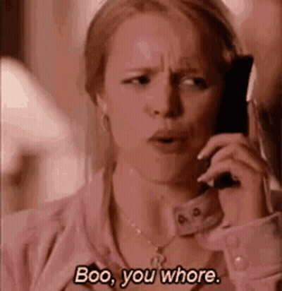 Woman Talking On Cell Phone Saying Boo You Whore GIF