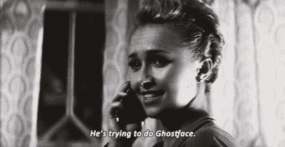 Woman Talking On Cell Phone Saying He's Trying To Do Ghostface GIF