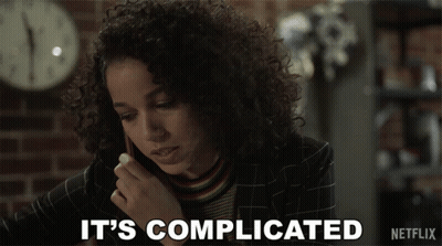 Woman Talking On Cell Phone Saying It's Complicated GIF