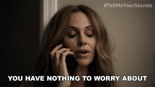Woman Talking On Cell Phone Saying Nothing To Worry About GIF