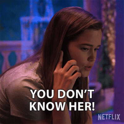 Woman Talking On Cell Phone Saying You Don't Know Her GIF