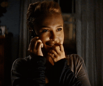 Woman Talking On Cell Phone Smiling GIF