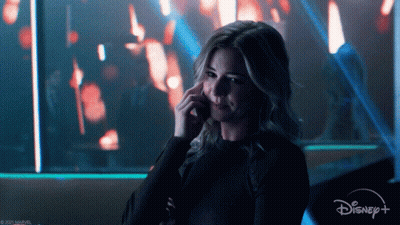 Woman Talking On Cell Phone With Disney Plus Logo GIF