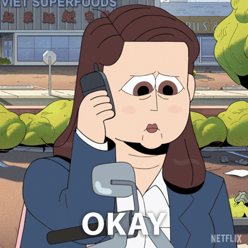 Woman Talking On Cell Phone With Okay GIF