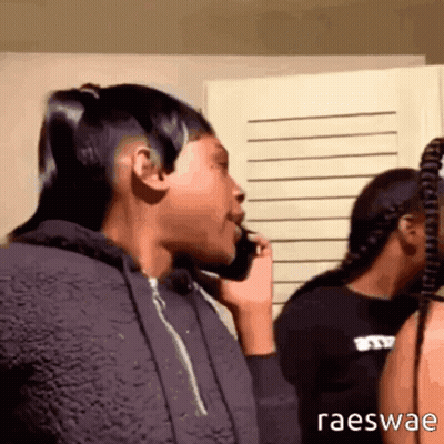Woman Talking On Cell Phone With Raeswae GIF