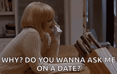 Woman Talking On Phone Asking About Date GIF