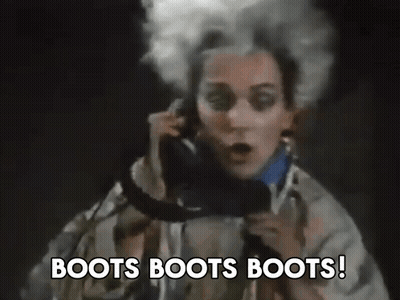 Woman Talking On Phone Boots Boots Boots GIF