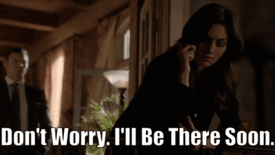 Woman Talking On Phone Don't Worry I'll Be There Soon GIF