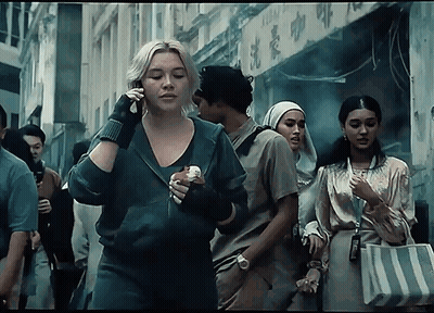 Woman Talking On Phone Holding Sandwich GIF