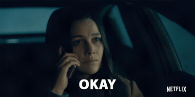 Woman Talking On Phone In Car Saying Okay GIF
